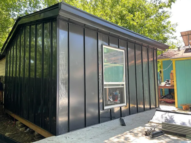 Black standing seam metal wall panels for Roof Inspection in Piqua