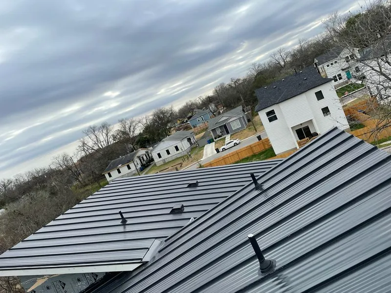 Standing seam metal roof panels with vents for Skylight Repair in Piqua
